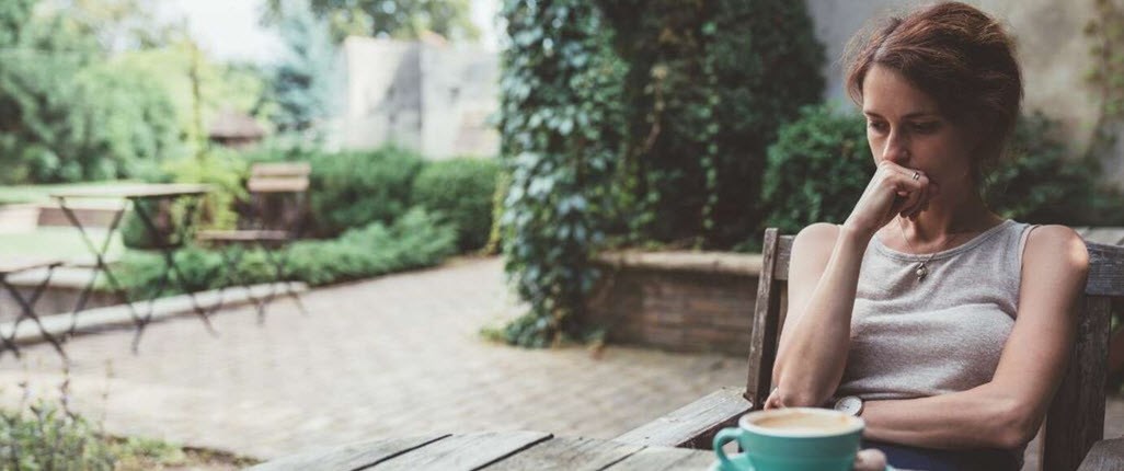 Angry woman sitting at the chair