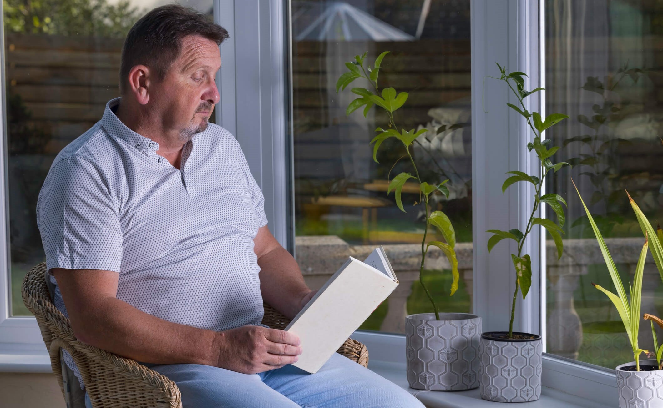 Man with heart failure relaxing and free from anxiety for the first time since practicing positive self-talk