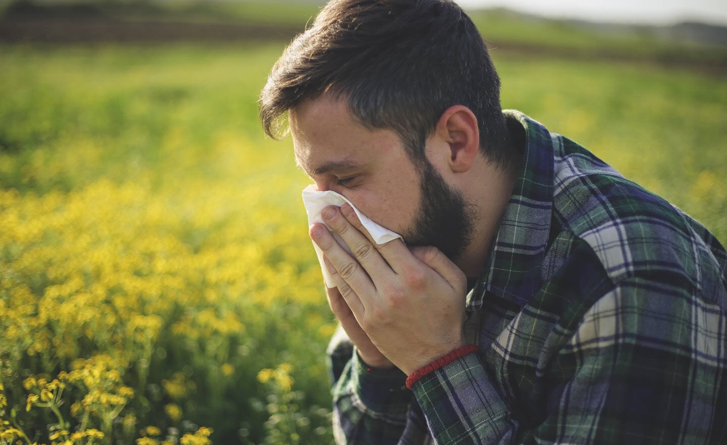 Man with asthma suffers from seasonal allergies