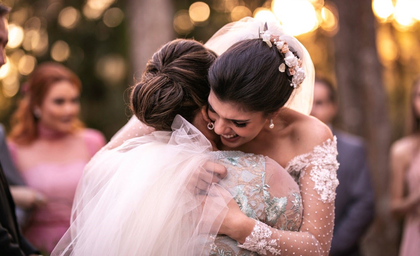 Mother with ADHD is proud as she hugs her newly married daughter