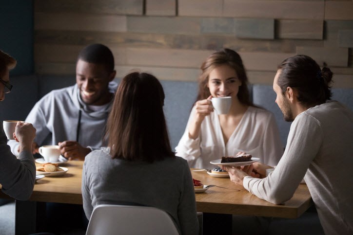 People talking and having a coffe