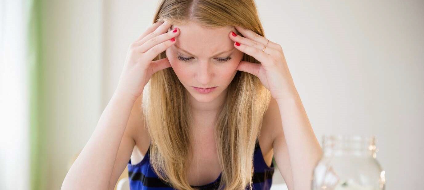 Woman looking over her finances, checking how much her asthma treatment has cost her this month