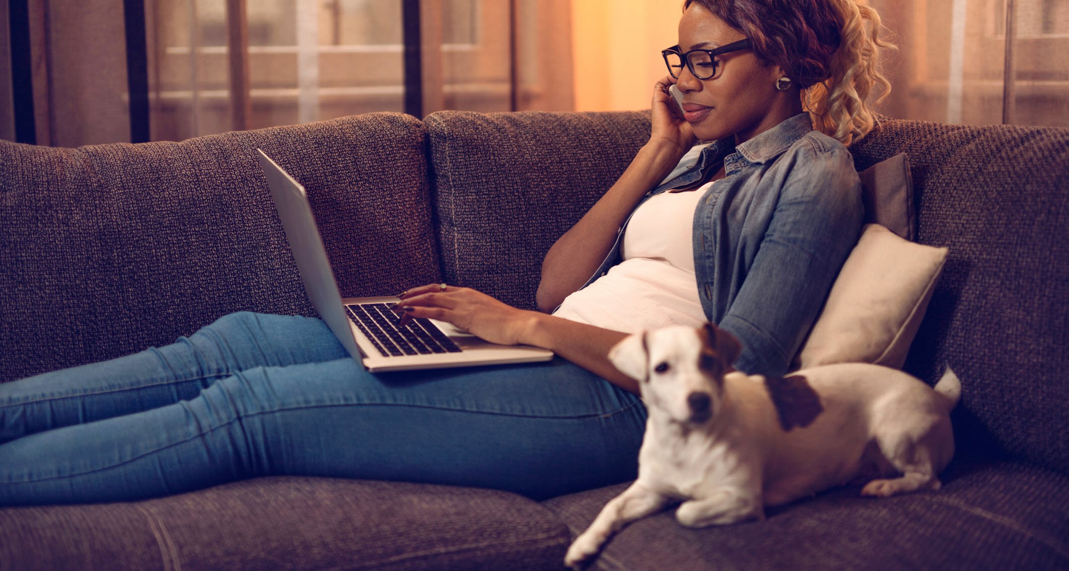 Woman talking on the phone while looking up her diagnosis online