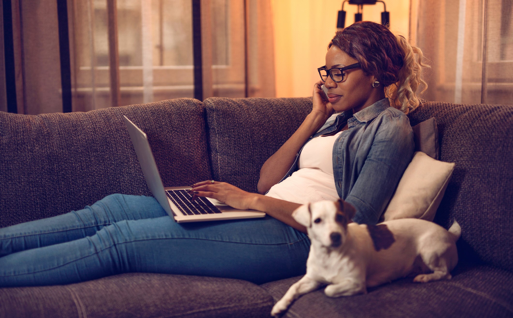 Woman talking on the phone while looking up her diagnosis online