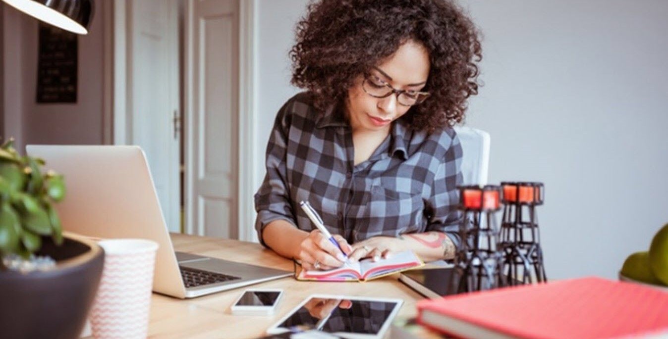 Woman with ADHD successfully managing her business from home