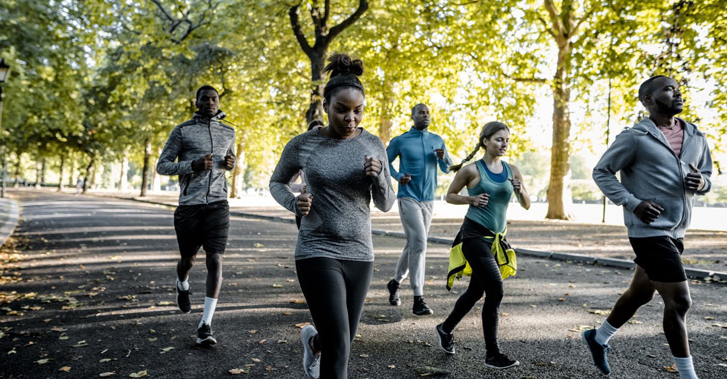 Woman with asthma running race with other athletes confident her asthma is under control