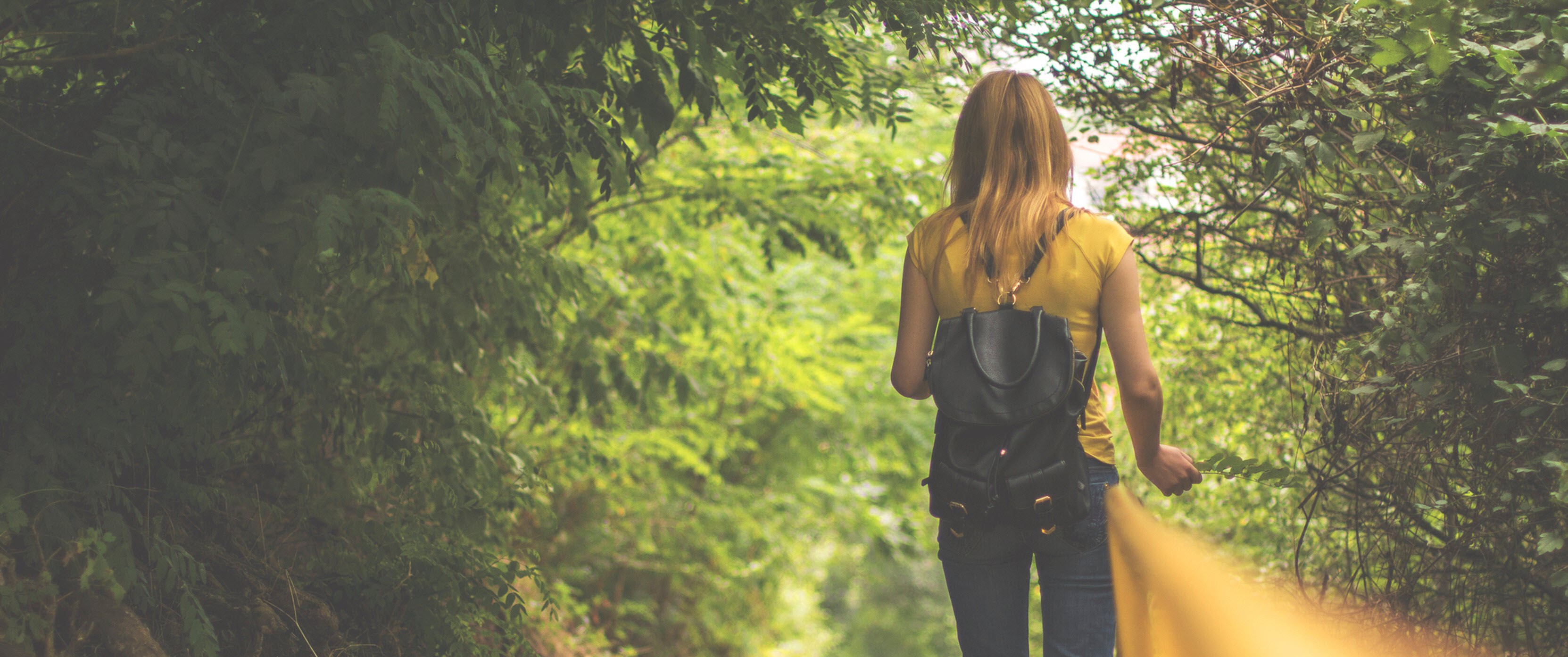 Woman with luggage ready to continue on a journey.