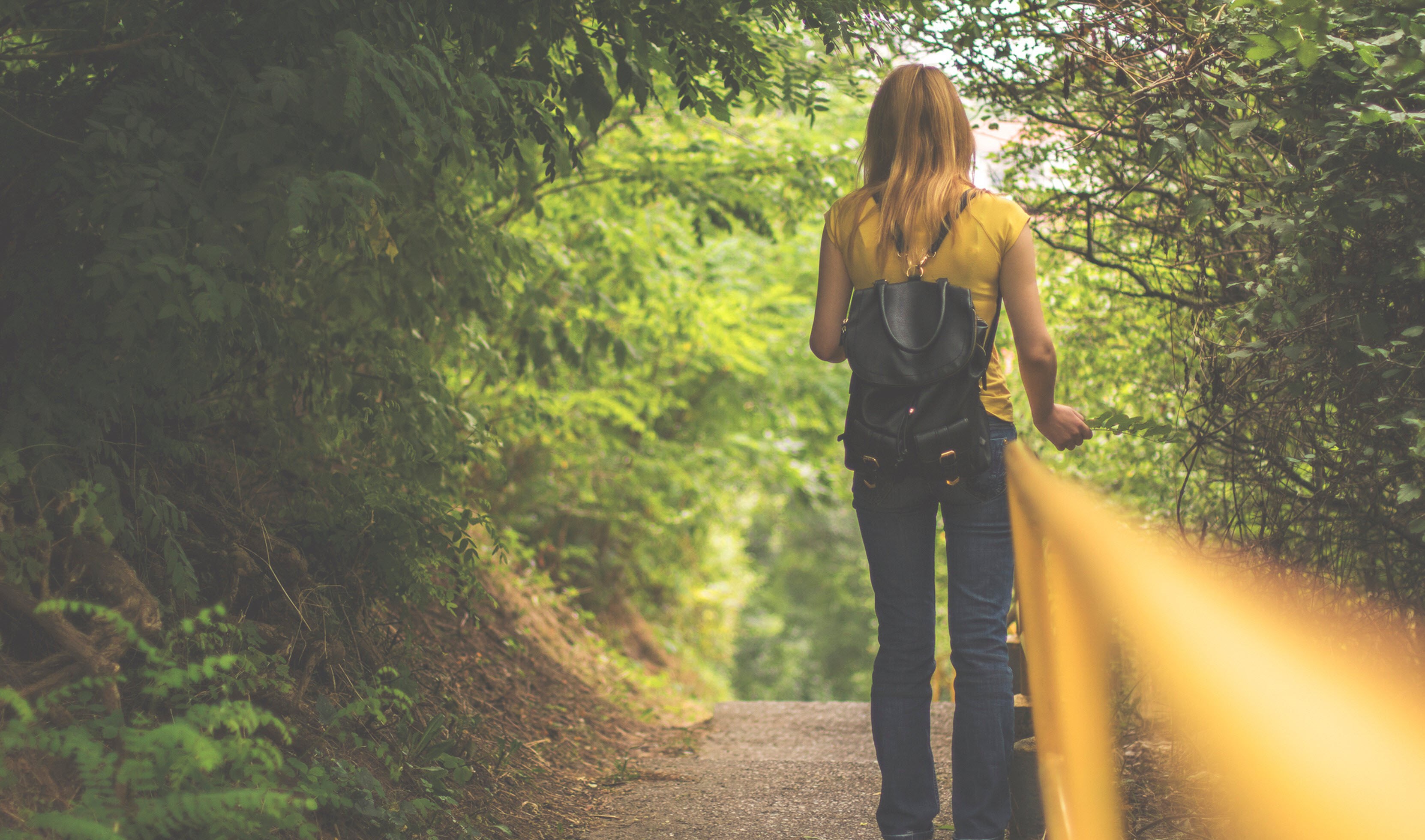 Woman with luggage ready to continue on a journey.