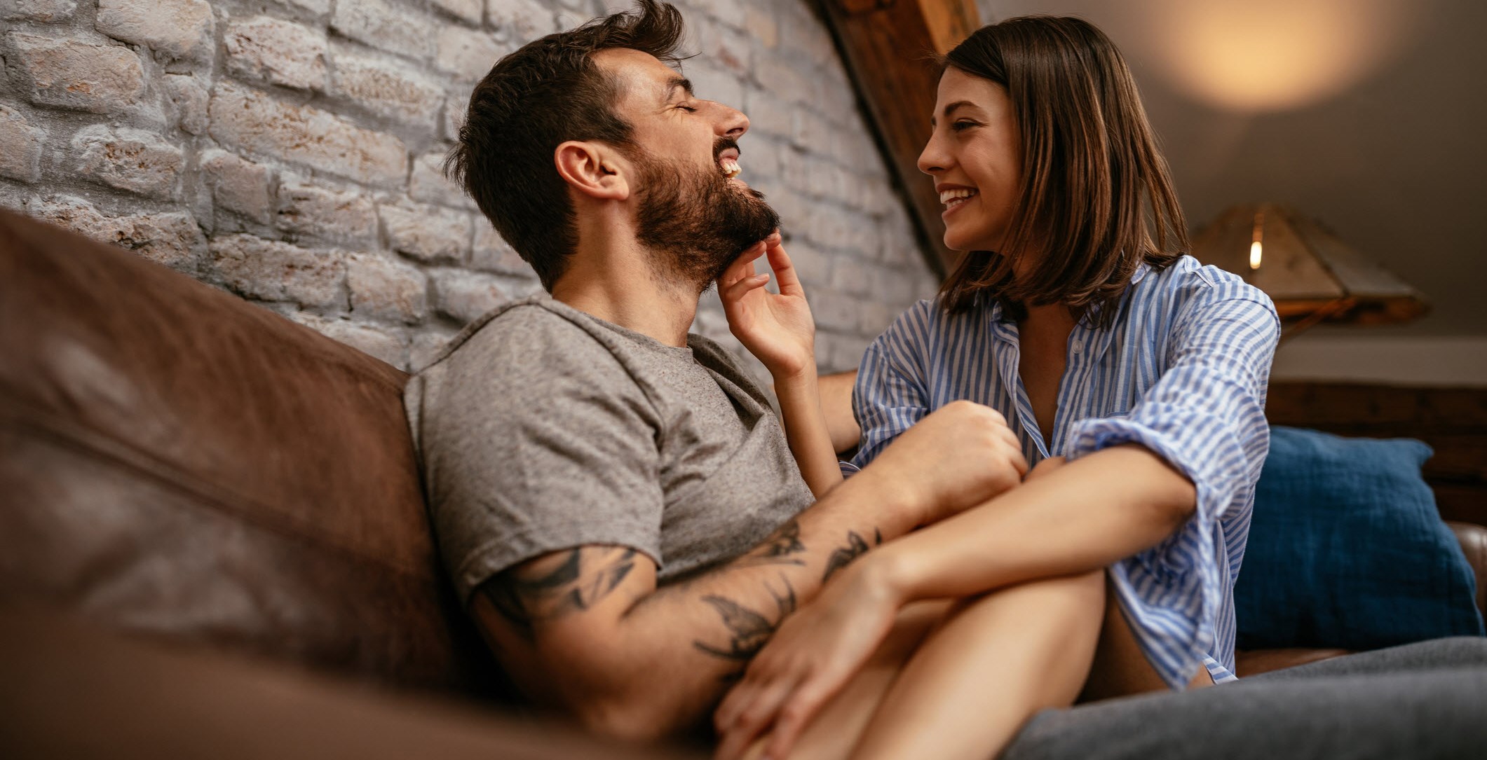 Man and woman smiling and enjoying their communicative relationship despite ADHD