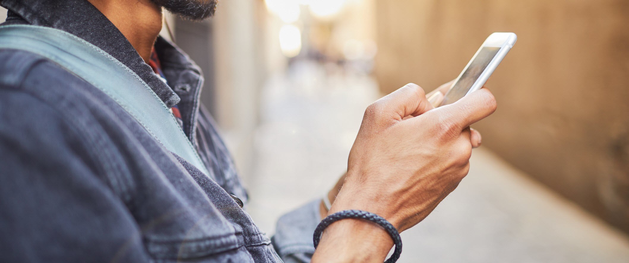 Man scrolling on his phone